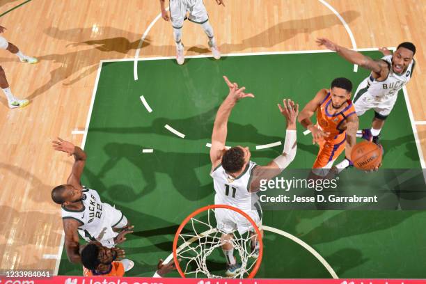 Cameron Payne of the Phoenix Suns shoots the ball against the Milwaukee Bucks during Game Four of the 2021 NBA Finals on July 14, 2021 at Fiserv...