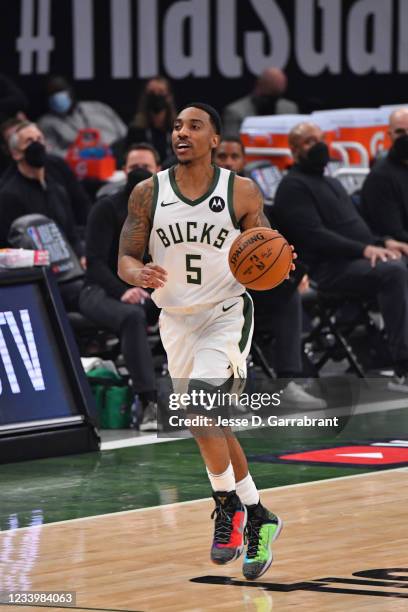Jeff Teague of the Milwaukee Bucks handles the ball against the Phoenix Suns during Game Four of the 2021 NBA Finals on July 14, 2021 at Fiserv Forum...