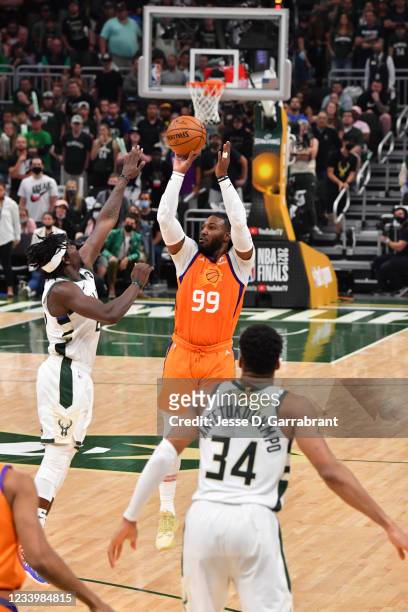 Jae Crowder of the Phoenix Suns shoots a three-pointer against the Milwaukee Bucks during Game Four of the 2021 NBA Finals on July 14, 2021 at Fiserv...