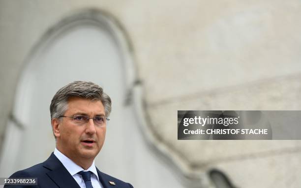 Croatia's Prime Minister Andrej Plenkovic gives a statement as he arrives for a visit during the summer retreat of Germany's conservative Christian...