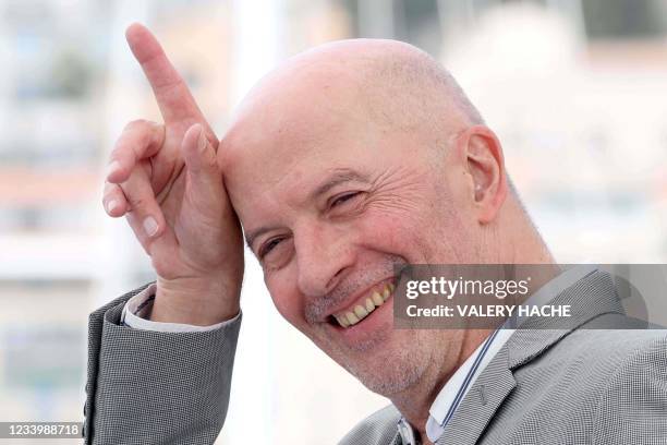 French director Jacques Audiard poses during a photocall for the film "Les Olympiades" at the 74th edition of the Cannes Film Festival in Cannes,...