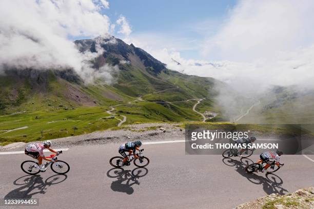 The pack descends the Tourmalet pass during the 18th stage of the 108th edition of the Tour de France cycling race, 129 km between Pau and Luz...