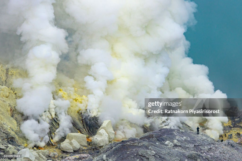Sunrise Scene of Crater of volcano Ijen. Java. Indonesia.