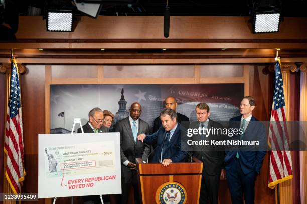 Sen. Sherrod Brown , center, flanked by Senate Democrats, Senate Majority Leader Chuck Schumer , Sen. Debbie Stabenow , Sen. Raphael Warnock , Sen....