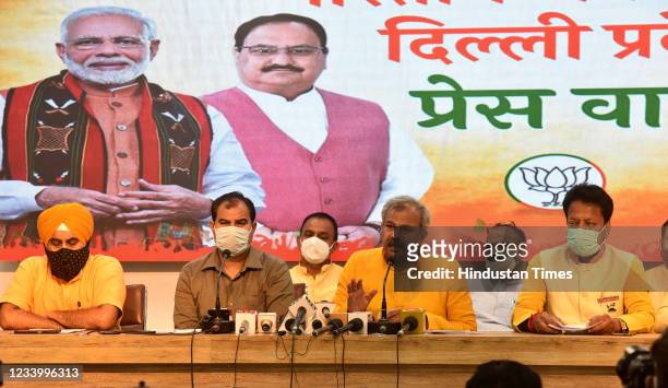 Delhi BJP president Adesh Gupta along with thre MCD Mayors Raja Iqbal Singh, Mukesh Suryan and Shyam Sunder Aggarwal during a press conference at the...