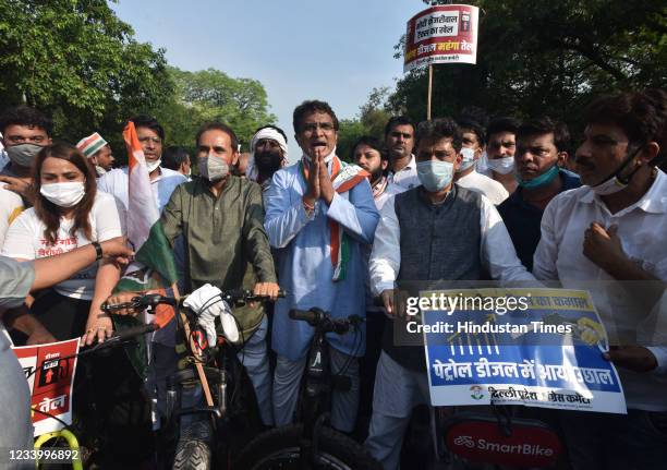 Delhi Pradesh Congress Committee, president Ch. Anil Kumar, along with AICC In-charge of Delhi Congress Shakti Sinh Gohil hold a cycle rally to...