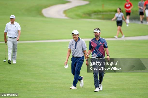 Brett Drewitt and Dylan Wu walk up the ninth hole during the first round of the Memorial Health Championship presented by LRS at Panther Creek...