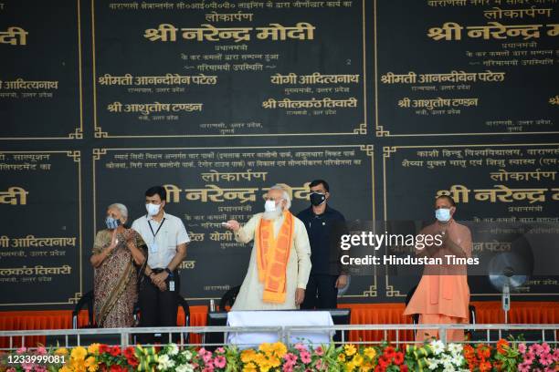 Prime Minister Narendra Modi with Chief Minister Yogi Adityanath and others during the inauguration and foundation stone laying of many projects...