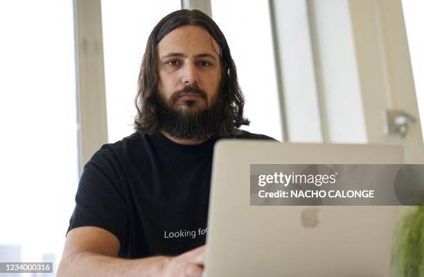 Victor Gevers, president of the Dutch Institute for Vulnerability Disclosure , poses in The Hague on July 14, 2021. - When a massive cyberattack took...