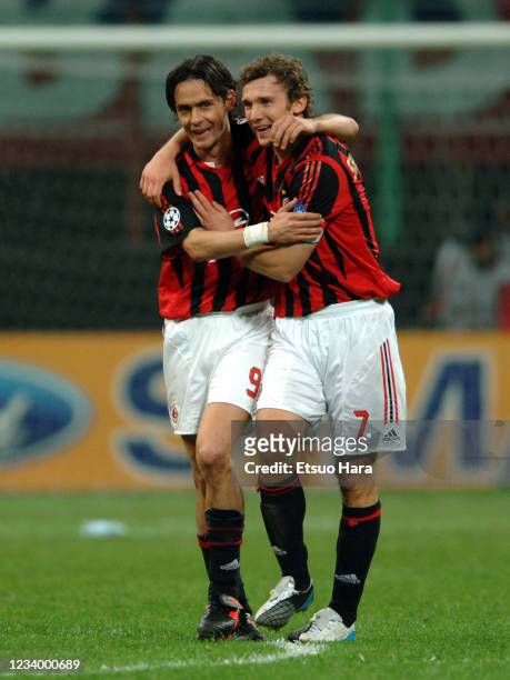 Filippo Inzaghi and Andriy Shevchenko of AC Milan celebrate their 3-1 victory in the UEFA Champions League Quarter-Final second leg match between AC...
