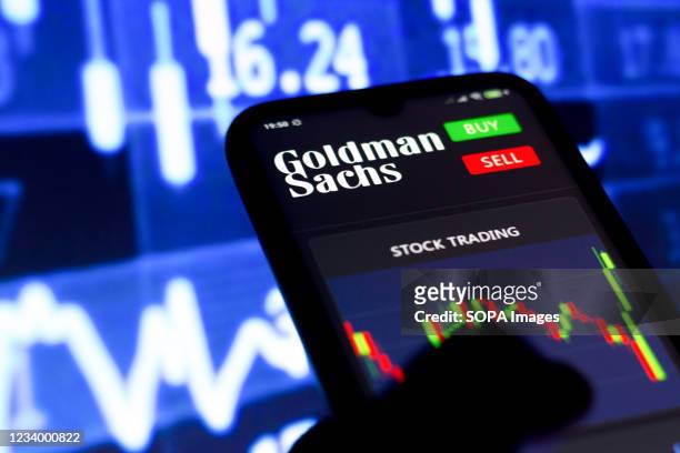 In this photo illustration the stock trading graph of Goldman Sachs Group seen on a smartphone screen.