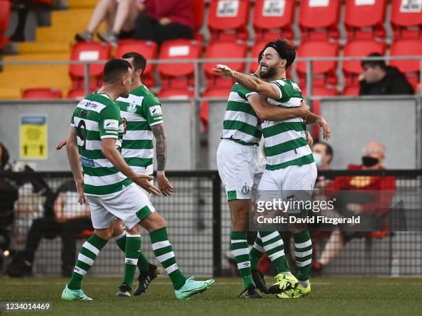 Derry , United Kingdom - 16 July 2021; Richie Towell of Shamrock Rovers, right, celebrates after scoring his side's fourth goal with team-mates...