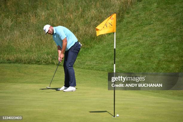 England's Jonathan Thomson watches his put just miss the hole on the 6th green during his third round on day 3 of The 149th British Open Golf...