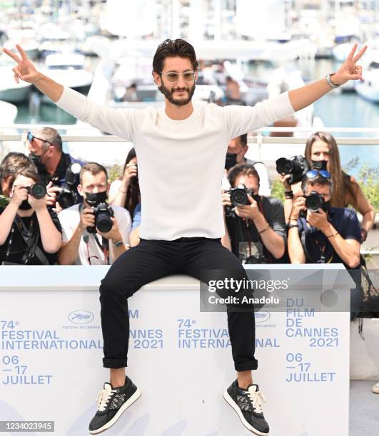 French actor Pierre Niney poses during a photocall for the film "OSS 117 : Alerte Rouge en Afrique Noire" at the 74th annual Cannes Film Festival in...