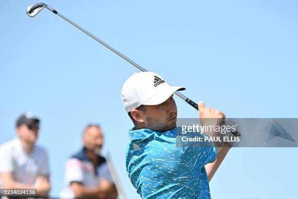 Golfer Daniel Berger watches his shot from the 3rd tee during his third round on day 3 of The 149th British Open Golf Championship at Royal St...