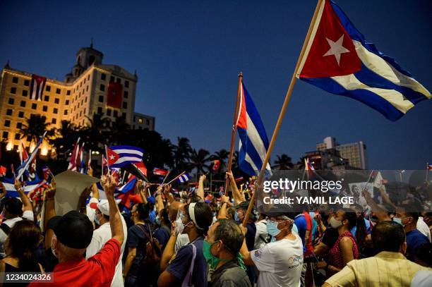 Cubans participate in an act of revolutionary reaffirmation to support the government of President Miguel Diaz-Canel in Havana, on July 17, 2021. -...