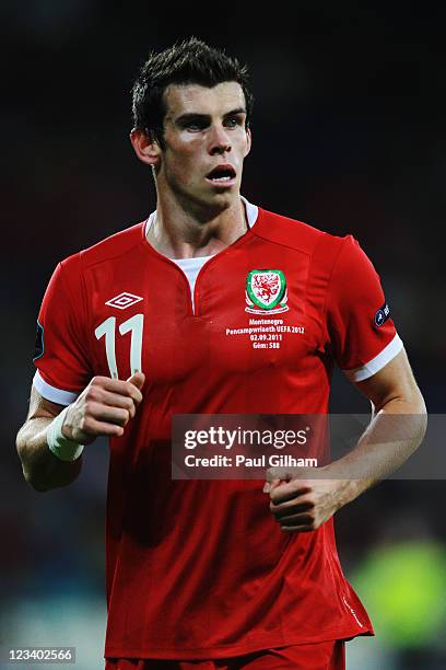 Gareth Bale of Wales in action during the UEFA EURO 2012 group G qualifying match between Wales and Montenegro at the Cardiff City Stadium on...