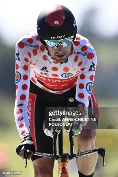 Team Bahrain's Wout Poels of Netherlands wearing the best climber's polka dot jersey crosses the finish line during the 20th stage of the 108th...