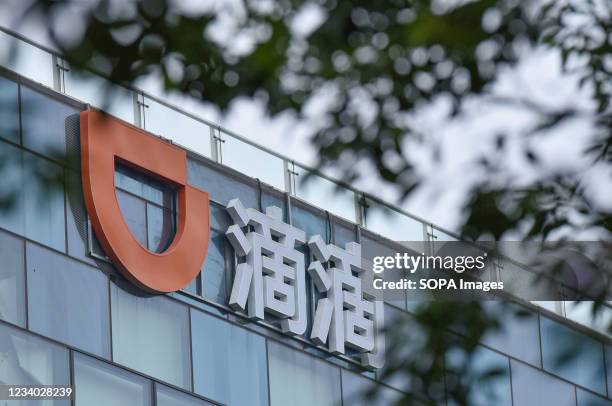 Didi Dache and Didi Kuaidi logo seen on the headquarters building in Haidian District of Beijing.