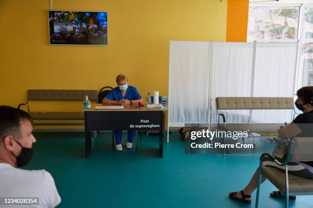 Nurse watch over people who were vaccinated in a vaccination center for allergic reactions on July 15, 2021 in Chisinau, Moldova. The United States...