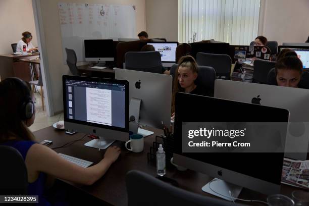 Investigative journalists of weekly anti-corruption investigative newspaper ZdG at work in the newsroom on July 15, 2021 in Chisinau, Moldova. The...