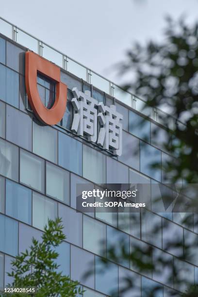 Didi Dache and Didi Kuaidi logo seen on the headquarters building in Haidian District of Beijing.