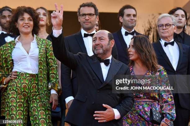 French actor Kad Merad and Julia Vignali pose with some of the 2020 nominees as they arrive for the screening of the film "OSS 117: From Africa With...