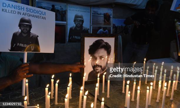 Members of the media held a candlelight vigil in memory of Reuters photojournalist Danish Siddiqui who was killed on July 16 while on assignment in...