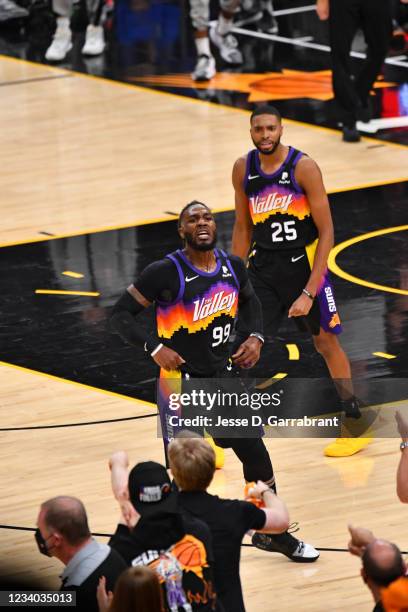 Mikal Bridges of the Phoenix Suns and Jae Crowder of the Phoenix Suns react during Game Five of the 2021 NBA Finals on July 17, 2021 at Footprint...