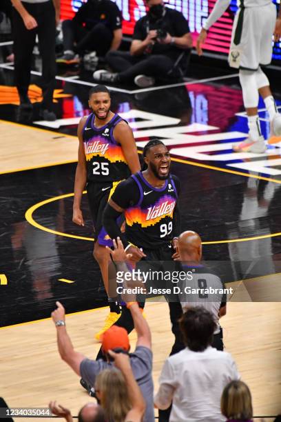 Mikal Bridges of the Phoenix Suns and Jae Crowder of the Phoenix Suns react during Game Five of the 2021 NBA Finals on July 17, 2021 at Footprint...