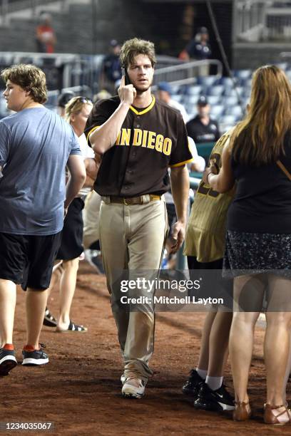 Wil Myers of the San Diego Padres looks for family after what was believed to be shots were heard during a baseball game between the San Diego Padres...