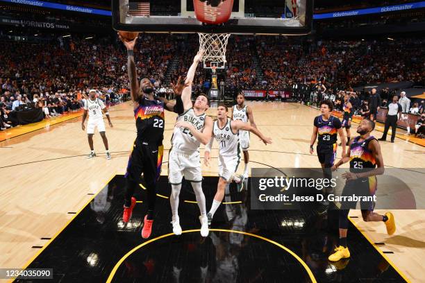 Deandre Ayton of the Phoenix Suns shoots the ball against the Milwaukee Bucks during Game Five of the 2021 NBA Finals on July 17, 2021 at Footprint...