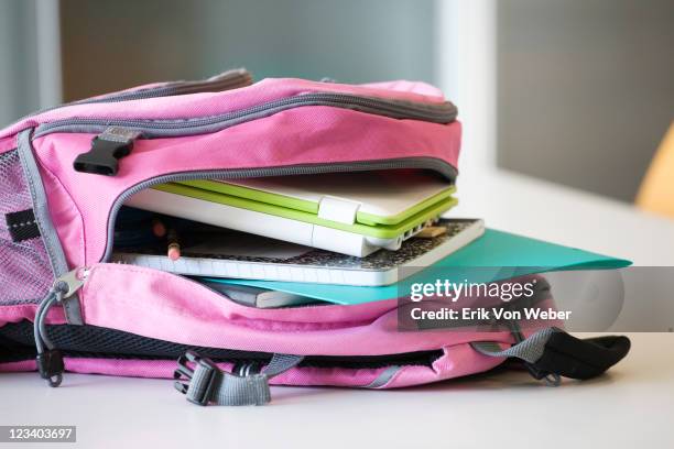 bookbag with laptop and notebooks inside - books and book open nobody imagens e fotografias de stock