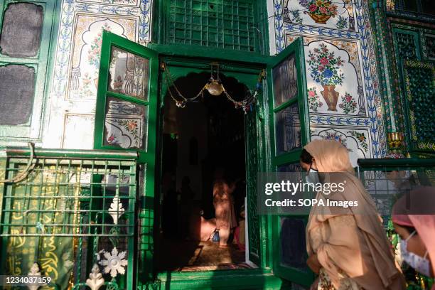 Kashmiri Muslim devotees pray inside the shrine of Sufi Saint Syed Ali Hamadani during his urs in Srinagar. Hundreds of Kashmiri Muslims Gathered at...