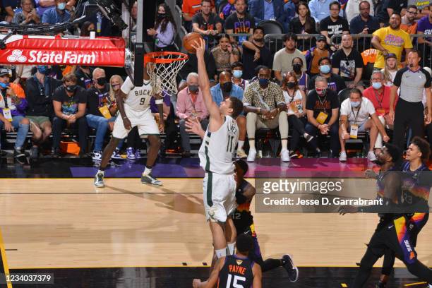 Brook Lopez of the Milwaukee Bucks dunks the ball against the Phoenix Suns during Game Five of the 2021 NBA Finals on July 17, 2021 at Footprint...