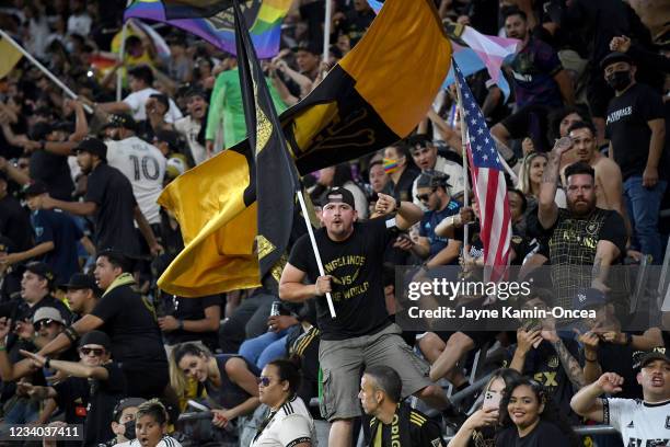 Los Angeles FC fans celebrate after a goal against Real Salt Lake at Banc of California Stadium on July 17, 2021 in Los Angeles, California.