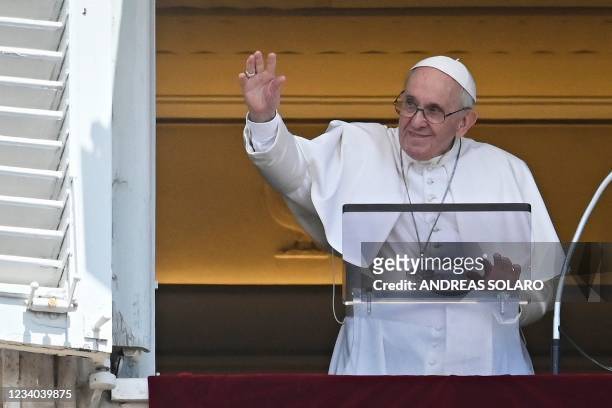 Pope Francis delivers the Sunday Angelus prayer from the window of his study overlooking St. Peter' Square at the Vatican on July 18, 2021. - Pope...
