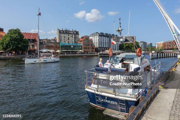 Ships, boats and yachts going on the Motlawa river are seen in Gdansk, Poland on 18 July 2021