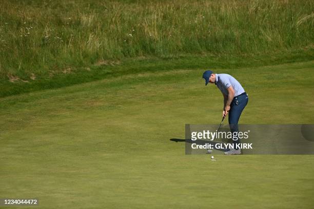 Golfer Daniel Berger puts on the 11th green during his final round on day 4 of The 149th British Open Golf Championship at Royal St George's,...