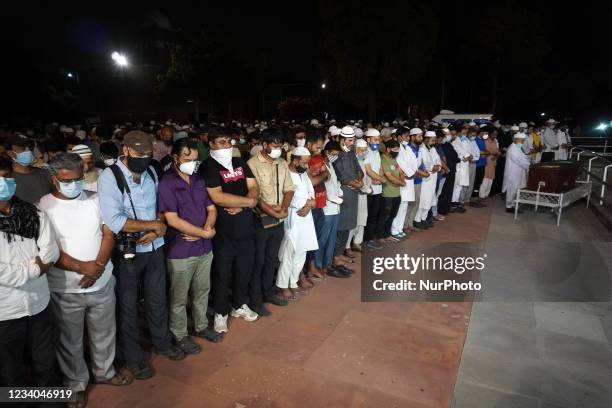 People attend funeral prayers for Reuters photographer Danish Siddiqui before his burial in New Delhi, India on July 18, 2021. The Pulitzer...