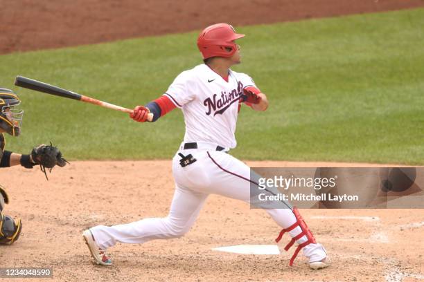 Juan Soto of the Washington Nationals hits a two-run home run in the eighth inning during a baseball game against the San Diego Padres at Nationals...
