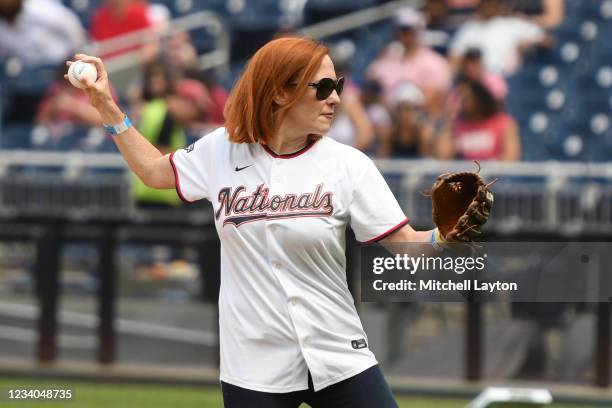 White House Press Secretary Jen Psaki throws out the first pitch before a baseball game between the San Diego Padres and the Washington Nationals at...