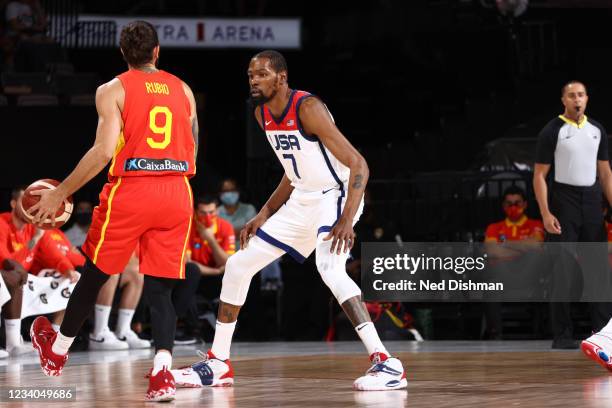 Kevin Durant of the USA Men's National Team plays defense on Ricky Rubio of the Spain Men's National Team during the game on July 18, 2021 at...