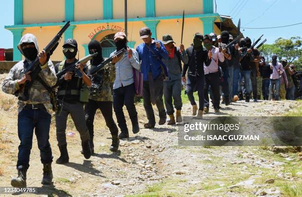 Members of the new self-defence group called "El Machete", that intends to combat criminal groups in the San Jose Tercero indigenous Tzotzil...