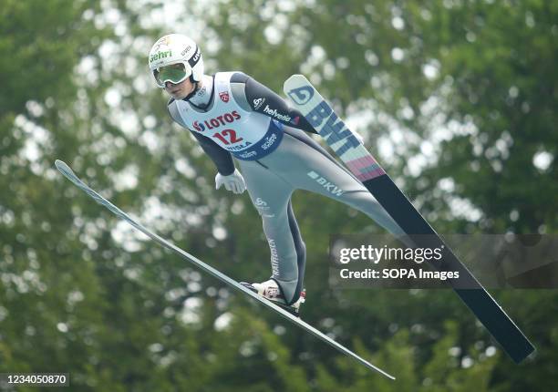 Sandro Hauswirth seen in action during the individual men's competition of the FIS Ski Jumping Summer Grand Prix in Wisla.