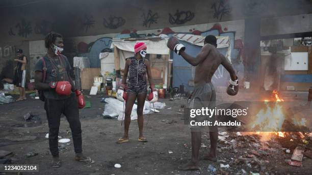 Homeless people recycle plastics and mannequins, cloths, discarded by stores and commerce in the north of the city, they set up a recycling in the...