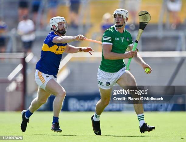 Cork , Ireland - 18 July 2021; Kyle Hayes of Limerick gets away from Michael Breen of Tipperary during the Munster GAA Hurling Senior Championship...