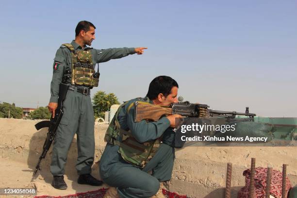 Afghan security force members take part in a military operation against Taliban militants in Kunduz city, Afghanistan, July 17, 2021. At least 53...