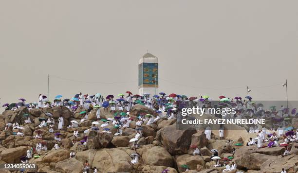 Muslim pilgrims gather around Mount Arafat, also known as Jabal al-Rahma , southeast of the holy city of Mecca, during the climax of the Hajj...