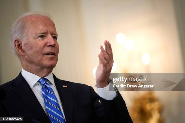 President Joe Biden speaks about the nation's economic recovery amid the COVID-19 pandemic in the State Dining Room of the White House on July 19,...